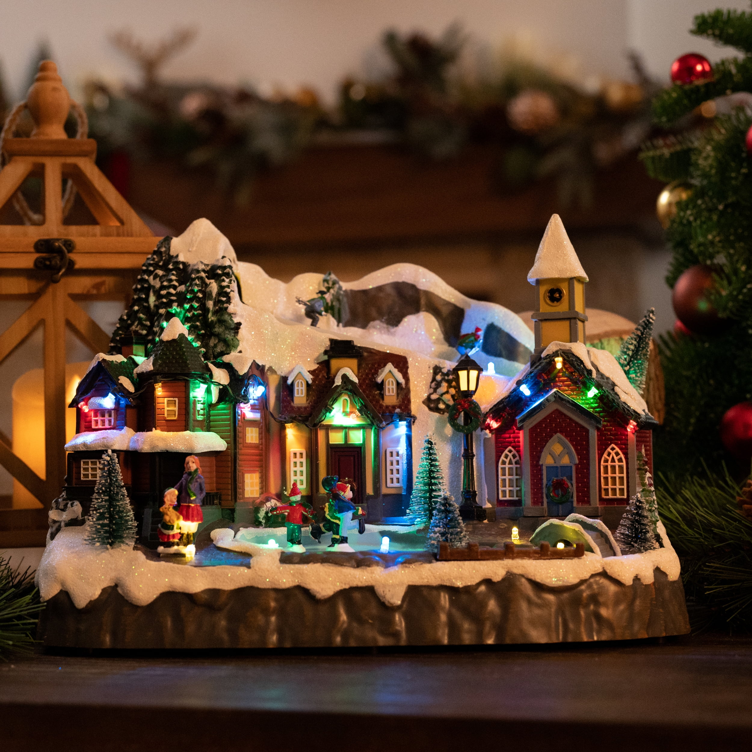 Valery Madelyn 13.3 inches Dynamic Christmas Village, Multi-color Lighted Sledding Down Hill Large Snow Skating Pond Musical Christmas Decoration for Holiday Table Top Decoration - Image 8