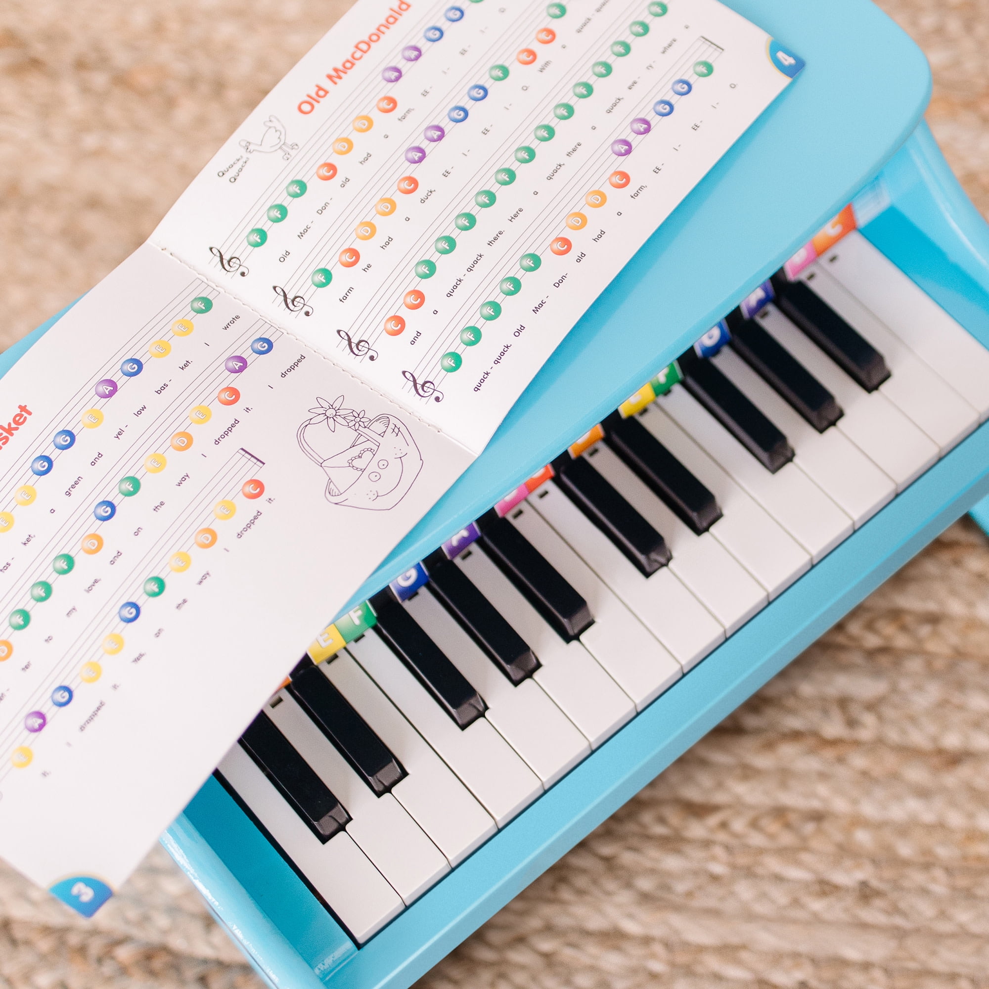 Melissa & Doug Learn-to-Play Piano with 25 Keys and Color-Coded Songbook - Blue - Image 6