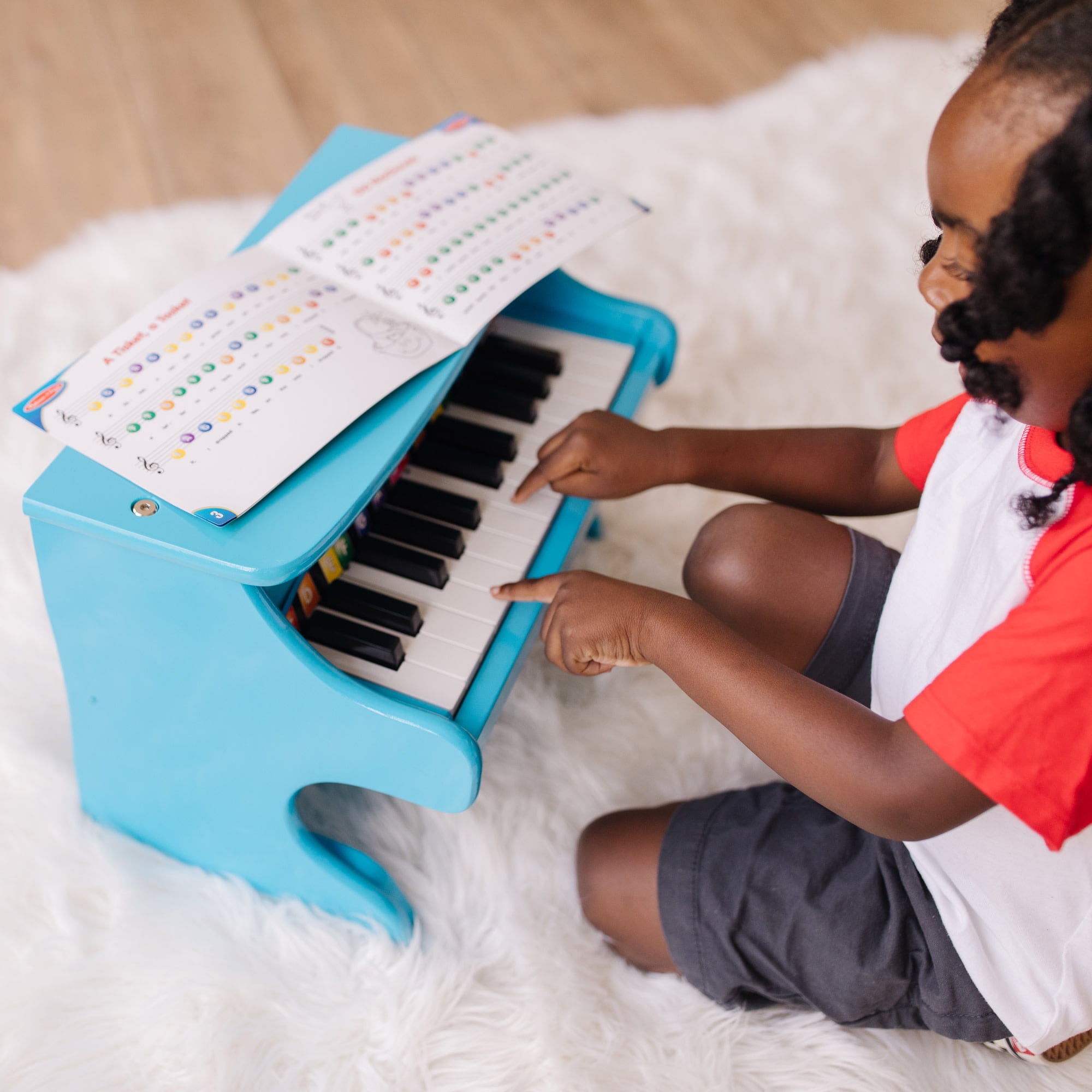 Melissa & Doug Learn-to-Play Piano with 25 Keys and Color-Coded Songbook - Blue - Image 9