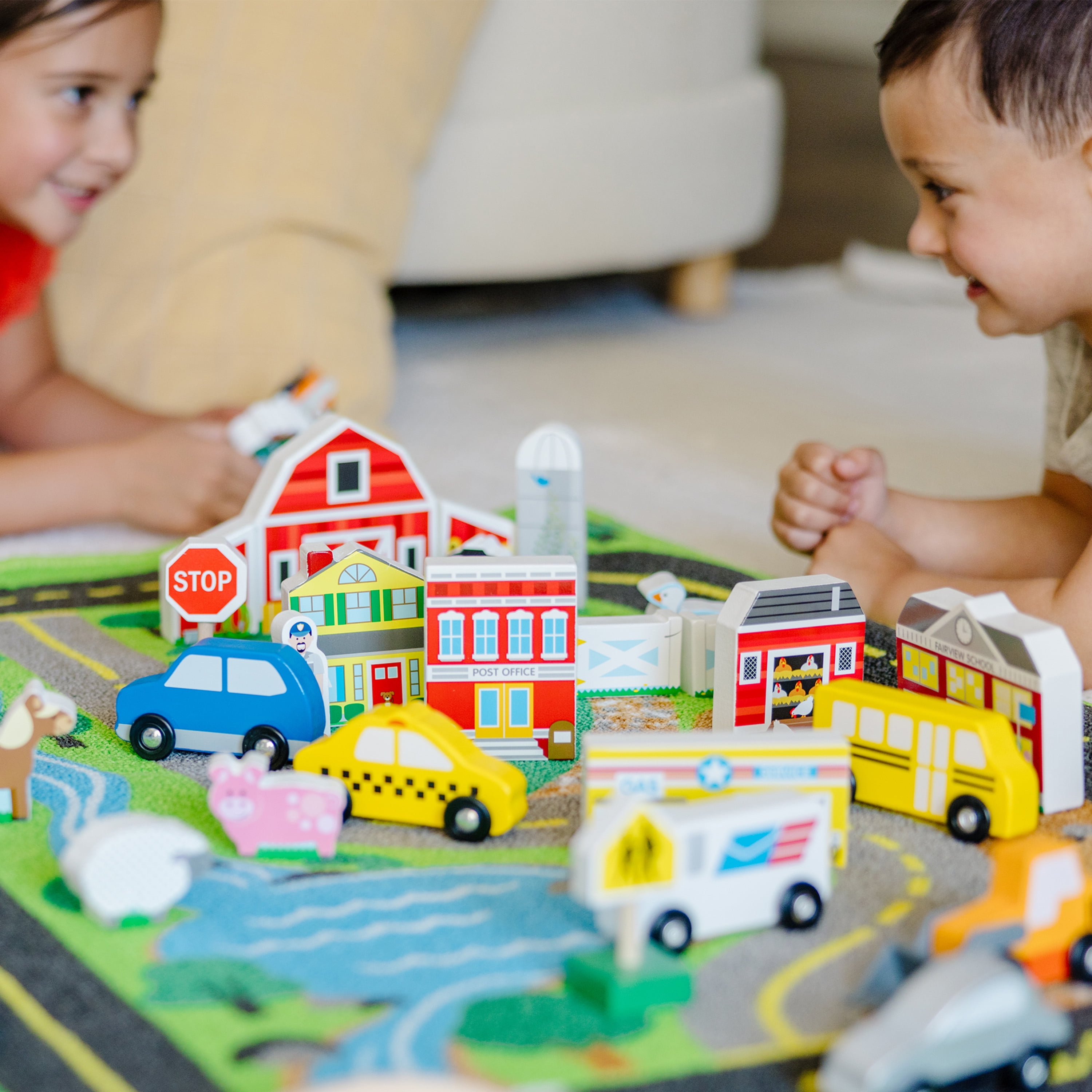 Melissa & Doug Deluxe Activity Road Rug Play Set with 49 Wooden Vehicles and Play Pieces - Image 8