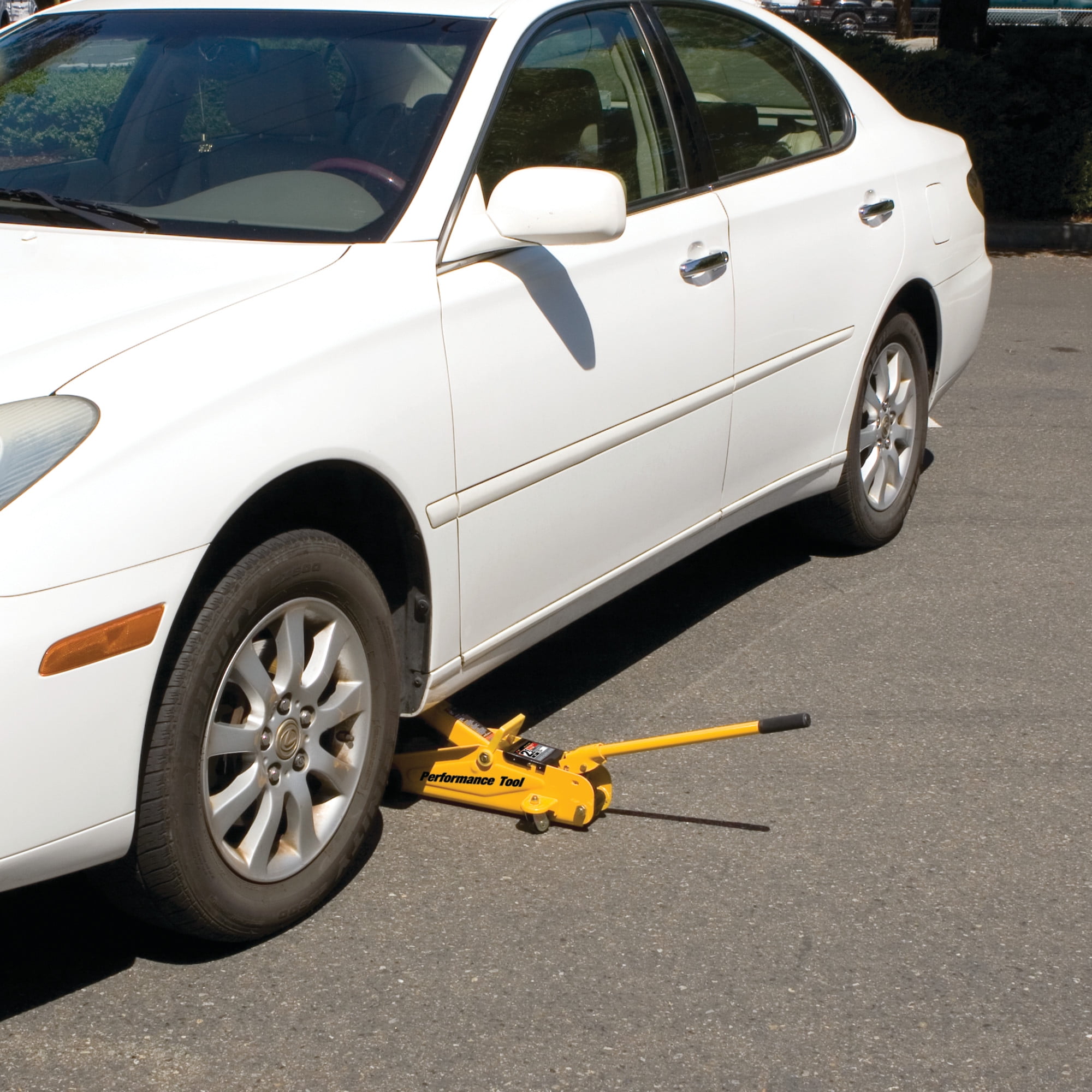 Performance Tool W1606 2-Ton Capacity Compact Trolley Jack - Carrying Handle, 4,000 Lbs. Capacity, Swivel Casters - Yellow - Image 7