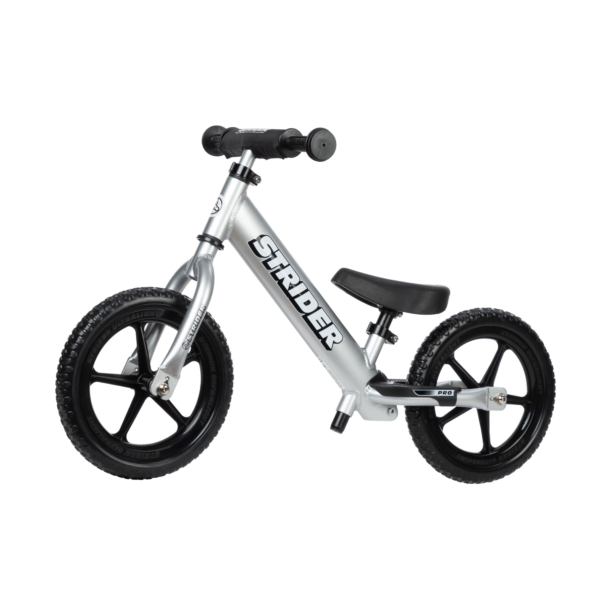 Strider 12” Pro Bike, Silver - No Pedal Balance Bicycle for Kids 1 to 4 Years - Includes Safety Pad, Padded Seat, Mini Grips & Flat-Free Tires - Tool Free