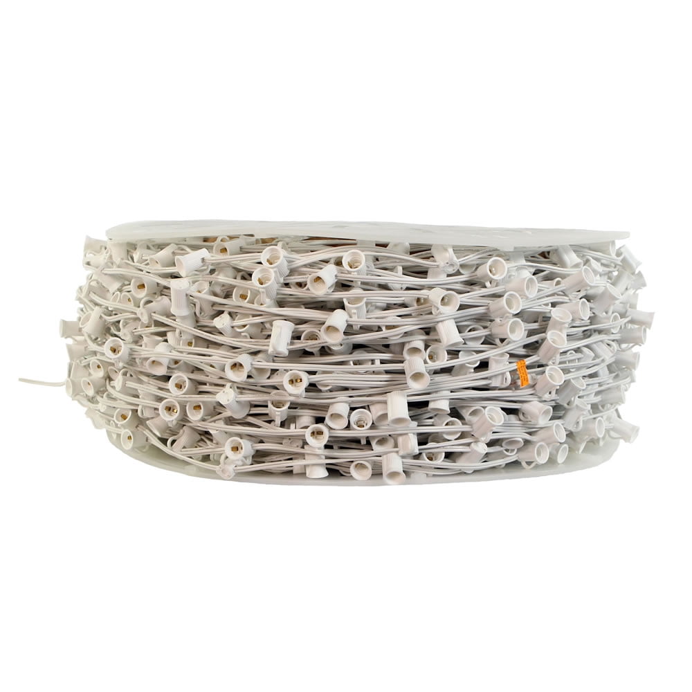 Vickerman 1000' C7 Socket Wire with 2000 C7 Sockets on SPT-1, 18 Wire Gauge, White. 1000' Length strand. 6" Socket spacing. 12" Male lead, 6" crimped end. Ability to replace the fuses in sockets.
